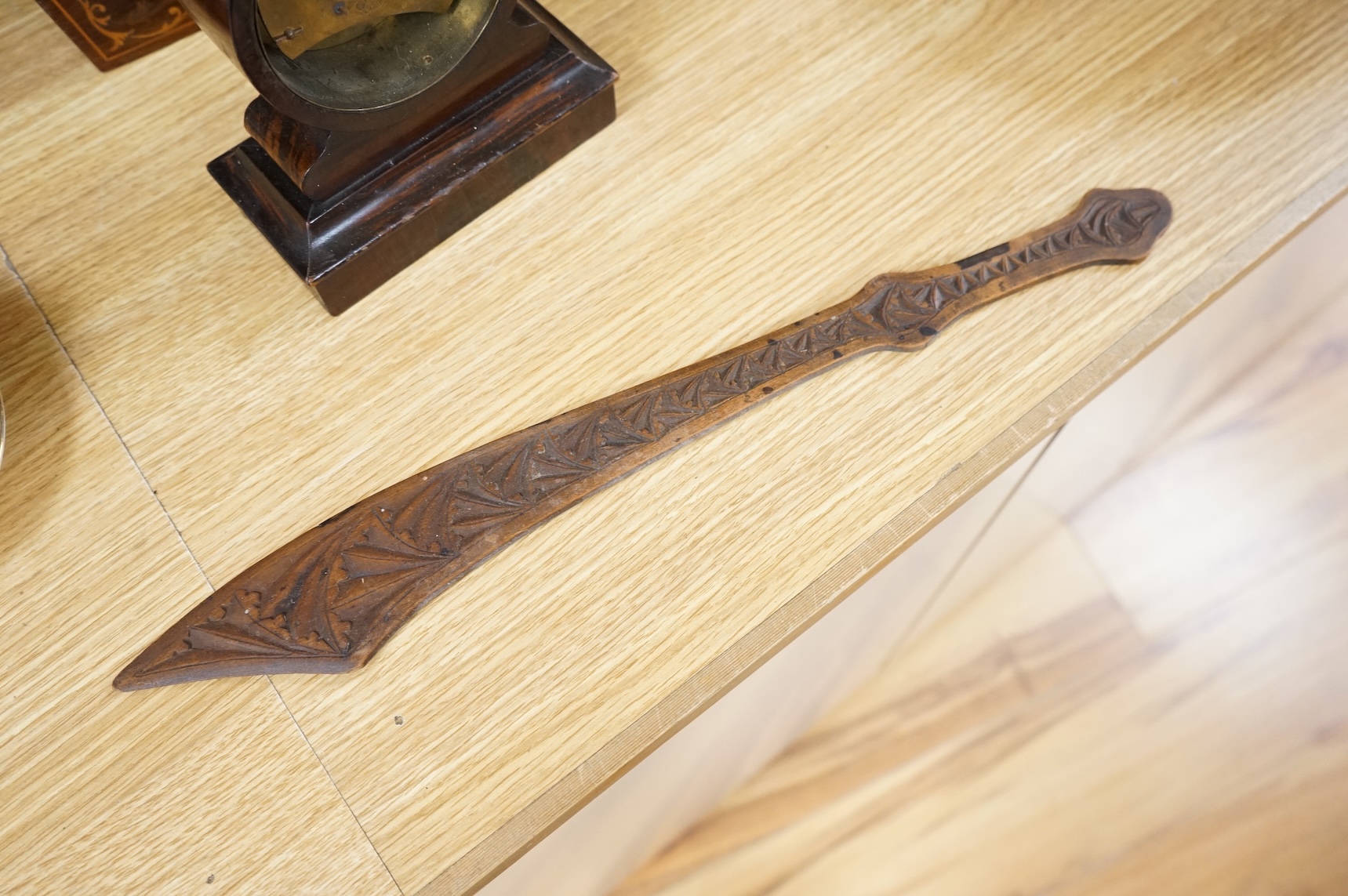 A 19th century rosewood and inlaid silk lined box, a small VAP timepiece and a carved page turner, largest 22cm wide
